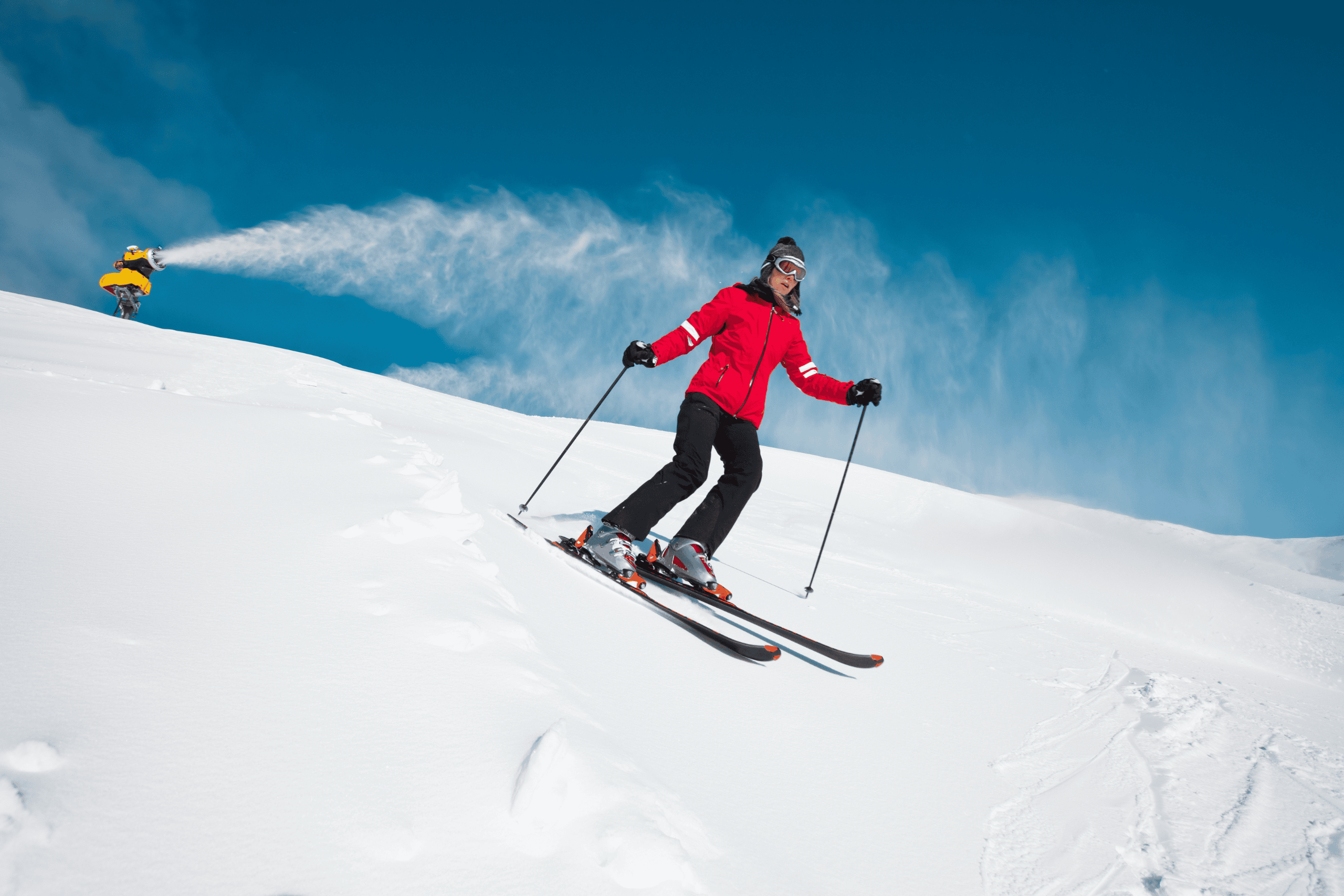 women skiing down the slope